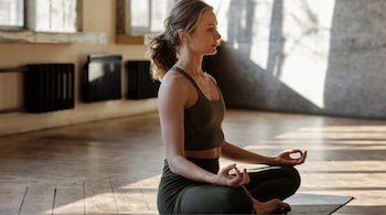 Overexercising, including excessive yoga practice, can disrupt your sleep patterns and make it difficult to fall asleep or stay asleep throughout the night. (Image: Canva)