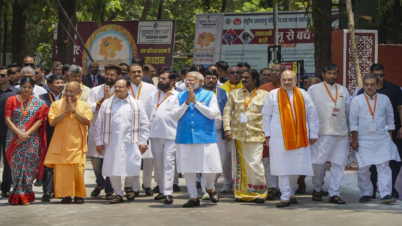 Varanasi: Prime Minister Narendra Modi accompanied by Union Home Minister Amit Shah, BJP President J P Nadda, UP CM Yogi Adityanath and other NDA leaders comes out after filing his nomination papers for Lok Sabha polls, in Varanasi, Uttar Pradesh, Tuesday, May 14, 2024. (PTI Photo)  (PTI05_14_2024_000134B) *** Local Caption ***