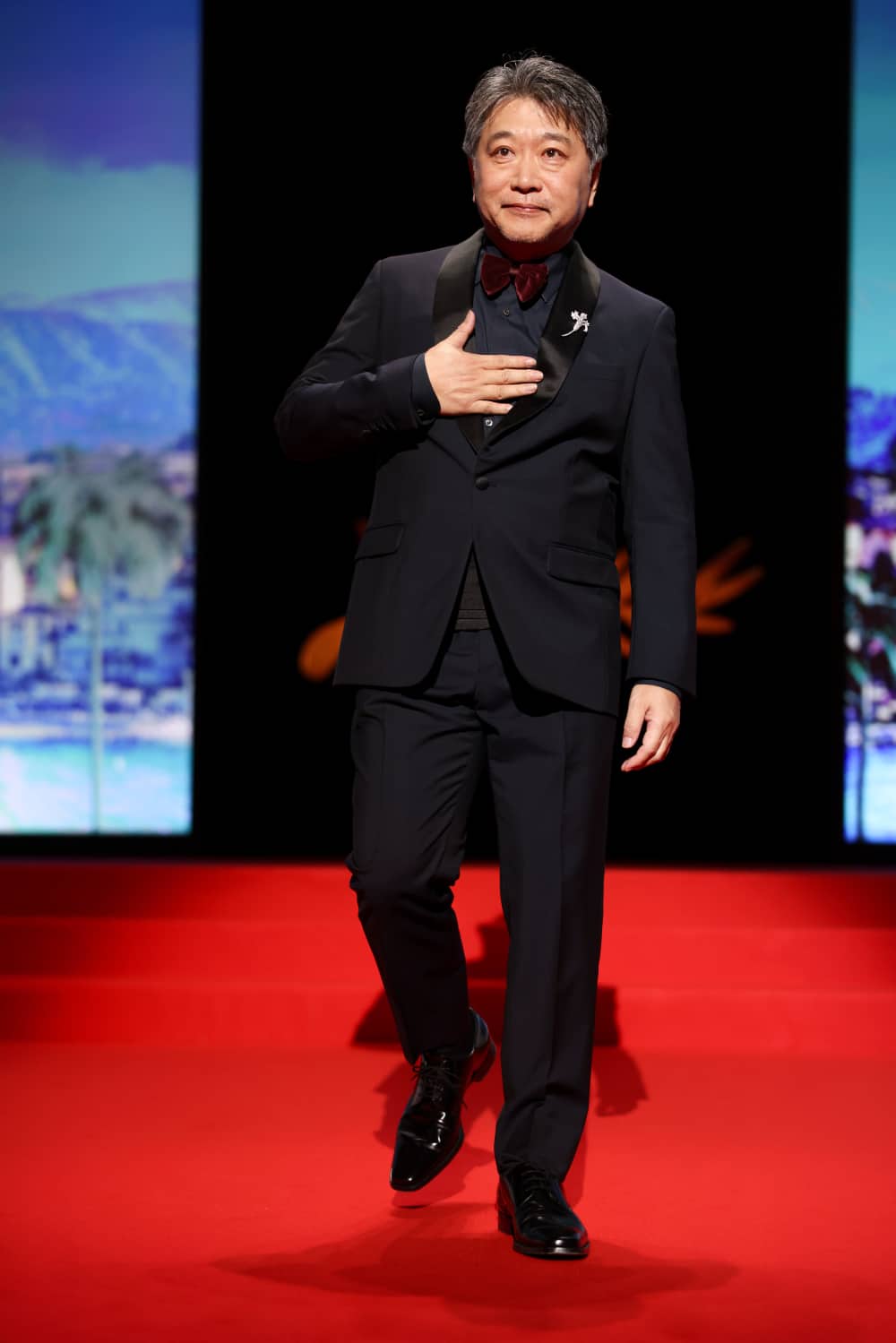 Jury member Kore-eda Hirokazu enters the opening ceremony of the 77th international film festival, Cannes, southern France, Tuesday, May 14, 2024. (Photo by Vianney Le Caer/Invision/AP)