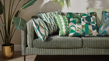 How to select cushions for living room: Use a colour wheel to pick matching or contrasting colours that go well with your walls and art (Image: Maishaa)