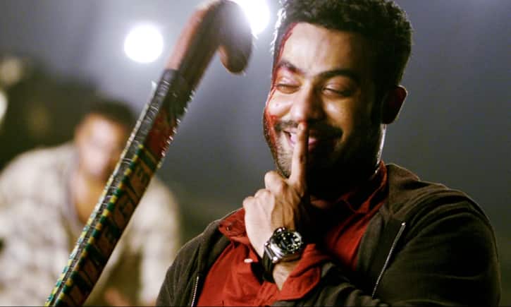 Temper (2015) Directed by Puri Jagannadh, 'Temper' is a significant film in Jr NTR's career, where he plays the role of Daya, a corrupt police officer who undergoes a transformation. The film's intense storyline, Jr NTR's powerful portrayal of a morally conflicted character, and his exceptional performance received widespread acclaim. 'Temper' is celebrated for its hard-hitting dialogues and the emotional depth Jr NTR brought to his character.