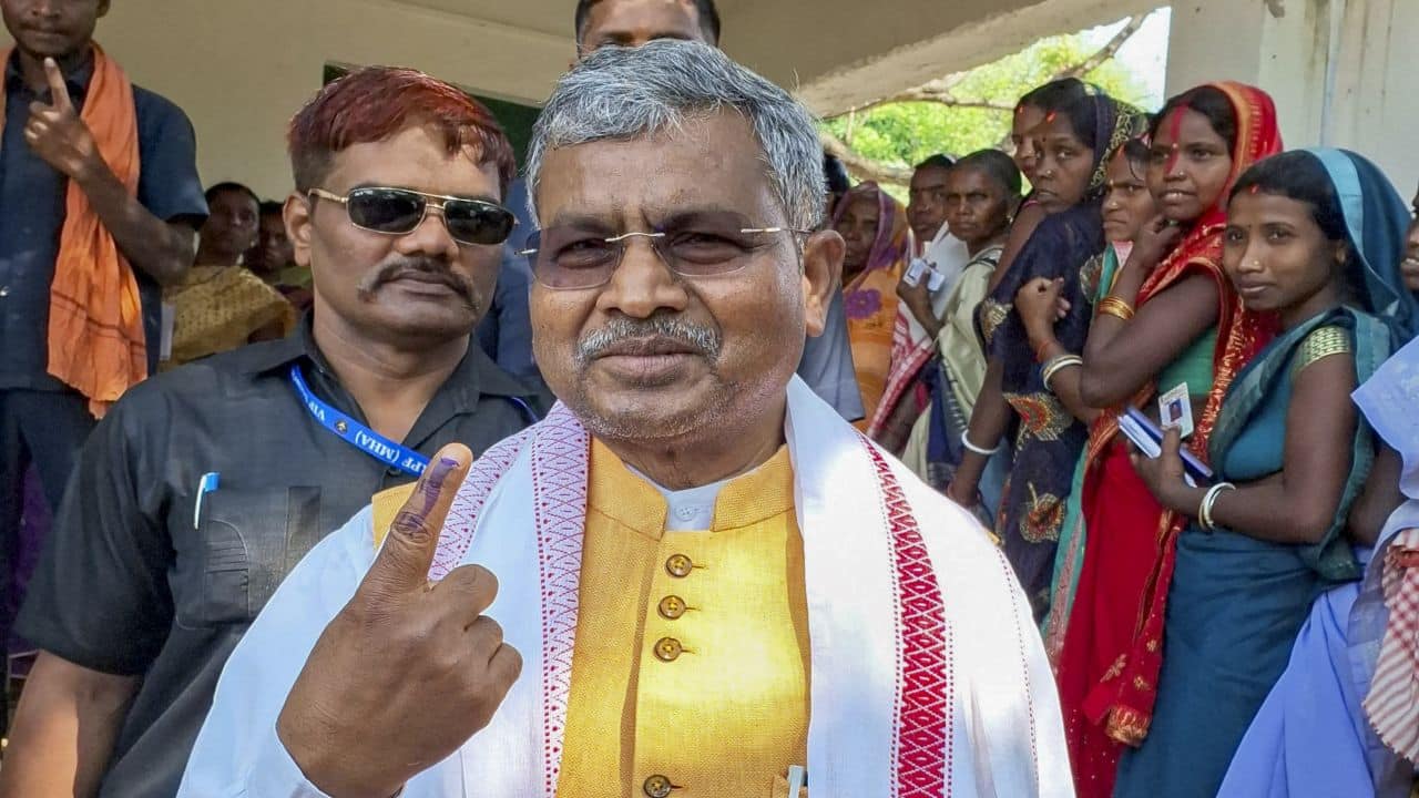 Jharkhand BJP President Babulal Marandi shows his inked finger after casting his vote during the Gandey assembly seat by-polls, in Giridih district, Monday, May 20, 2024. (PTI Photo)