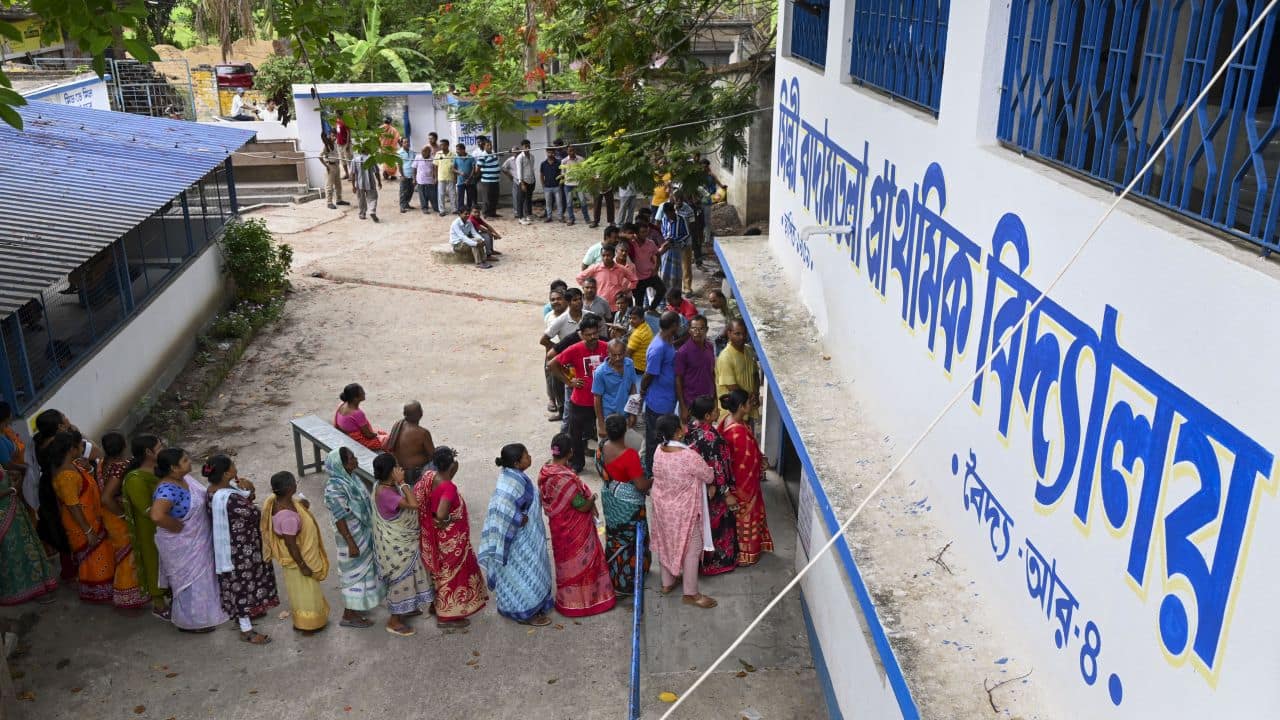 Hooghly: People wait in queues to cast their votes during the fifth phase of Lok Sabha elections, in Hooghly district, Monday, May 20, 2024. (PTI Photo)(PTI05_20_2024_000071B)