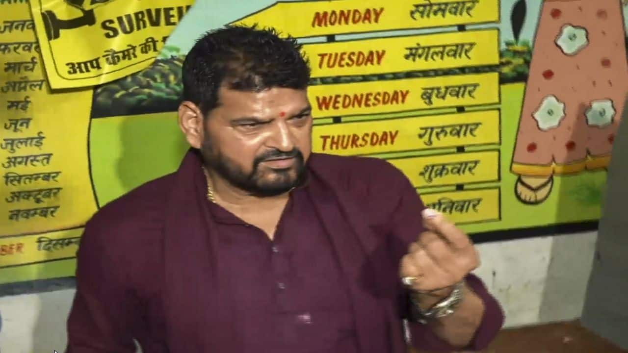 **EDS: SCREENSHOT VIA PTI VIDEOS** Gonda: BJP leader Brij Bhushan Sharan Singh shows his inked finger after casting his vote for the fifth phase of Lok Sabha elections, in Gonda, Monday, May 20, 2024. (PTI Photo)(PTI05_20_2024_000089B)
