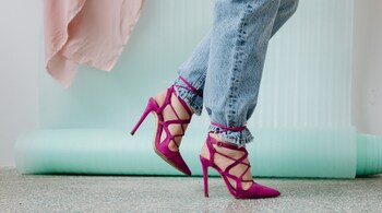 Health risks of wearing high heels: High heels can negatively impact your posture. By pushing your body weight forward, they can cause misalignment of your spine and lead to lower back pain (Image: Canva)