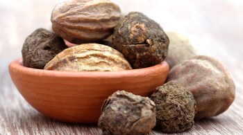 Health benefits of triphala: Natural cleansers are effective for maintaining eye health and preventing infections. Triphala, a traditional Ayurvedic formulation, is particularly useful (Image: Canva)