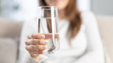 Water Staying hydrated with water is crucial as it helps the brain function properly, which can indirectly reduce anxiety. (Image: Canva)