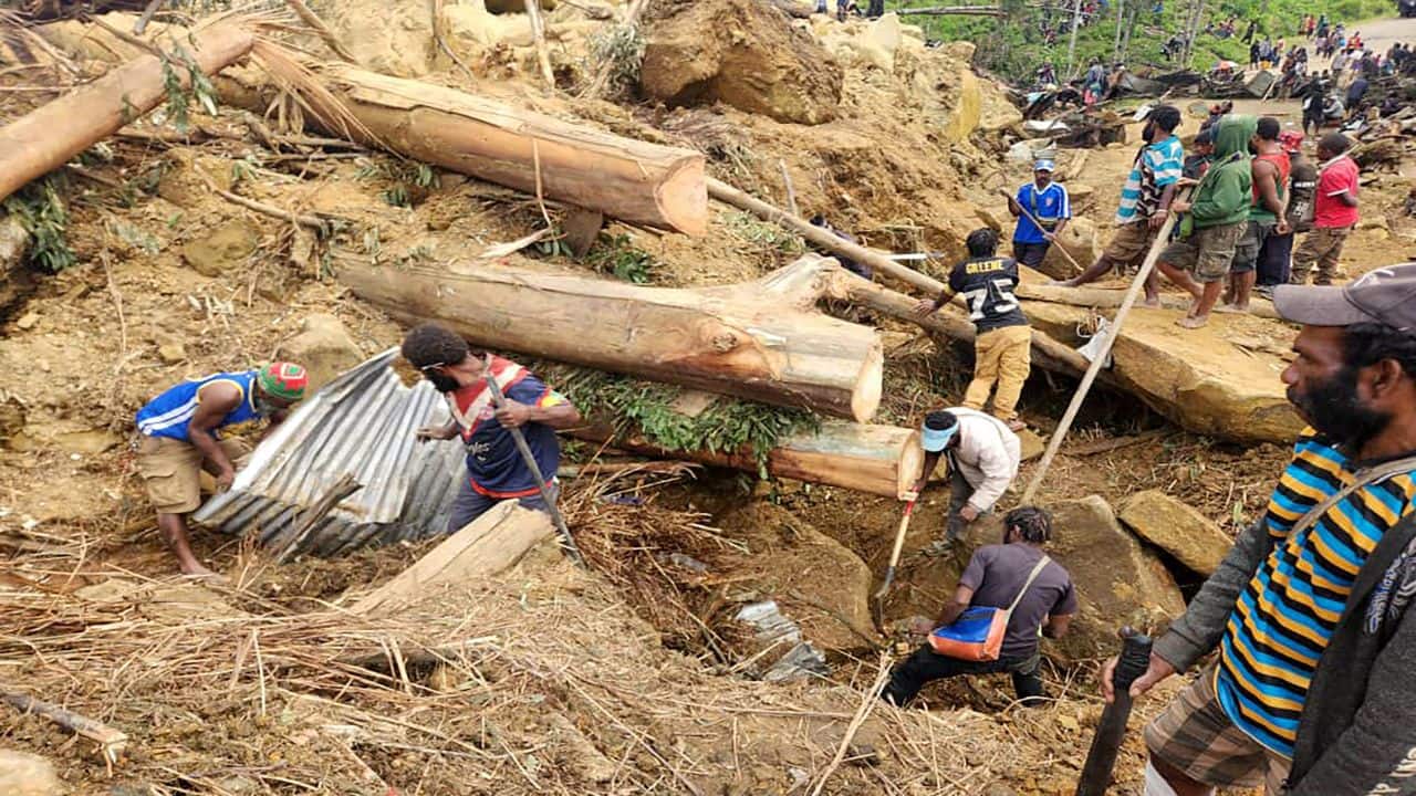 Papua New Guinea says over 2,000 people buried in landslide ...