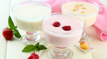 Flavoured yoghurts often come loaded with sugar—sometimes three times more than plain yoghurt. (Image: Canva)