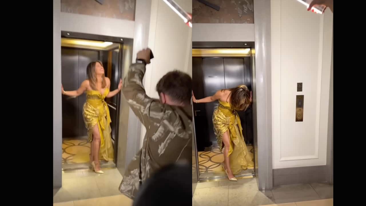 Priyanka Chopra laughs it off with grace as her heel gets stuck in a lift; Watch video Priyanka Chopra laughs it off with grace as her heel gets stuck in a lift; Watch video