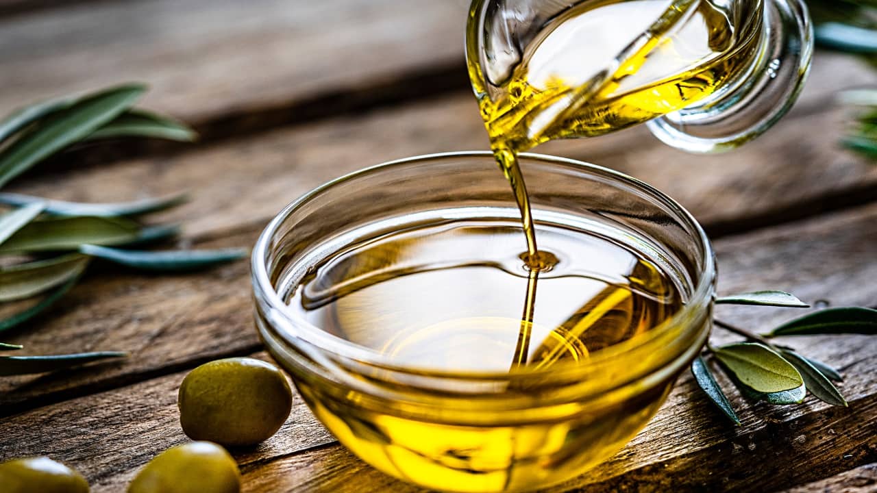 Health benefits of olive oil: Rich in monounsaturated fats and antioxidants, olive oil helps reduce LDL cholesterol and increase HDL cholesterol (Image: Canva)