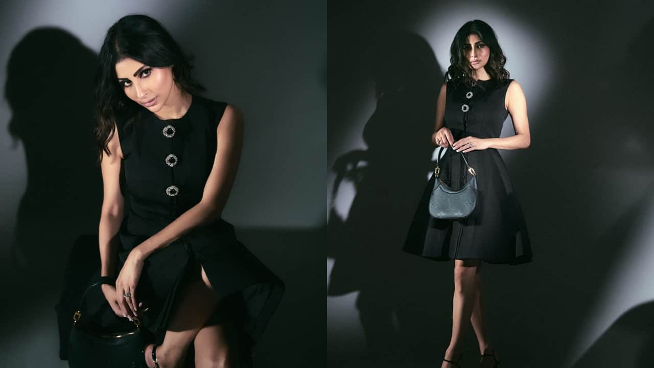 Mouni Roy makes a style statement in a black Louis Vuitton midi dress and handbag