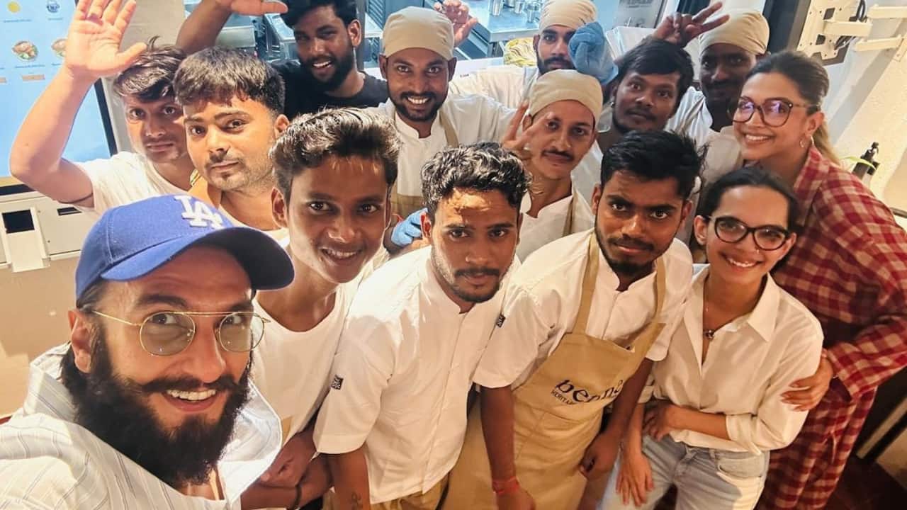 Heavily pregnant Deepika Padukone, hubby Ranveer Singh pose for a happy selfie with restaurant staff
