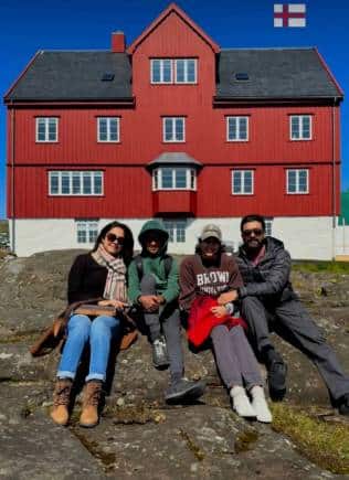Suriya posing with his family.