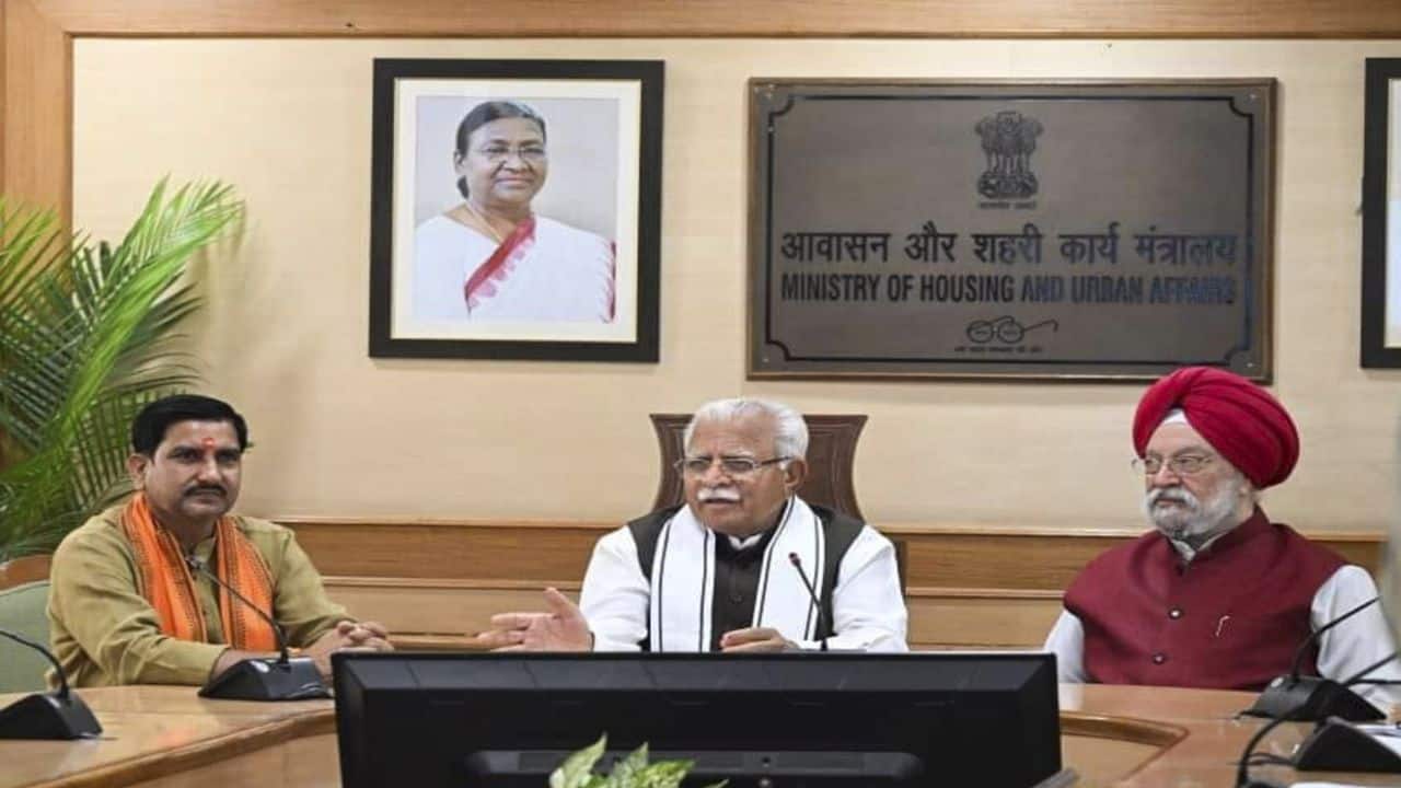 **EDS: IMAGE VIA @mlkhattar ON TUESDAY, JUNE 11, 2024** New Delhi: Union Minister Manohar Lal Khattar takes charge as Minister of Housing and Urban Affairs, in New Delhi. Union Minister Hardeep Singh Puri and MoS Tokhan Sahu are also seen. (PTI Photo) (PTI06_11_2024_000228B)