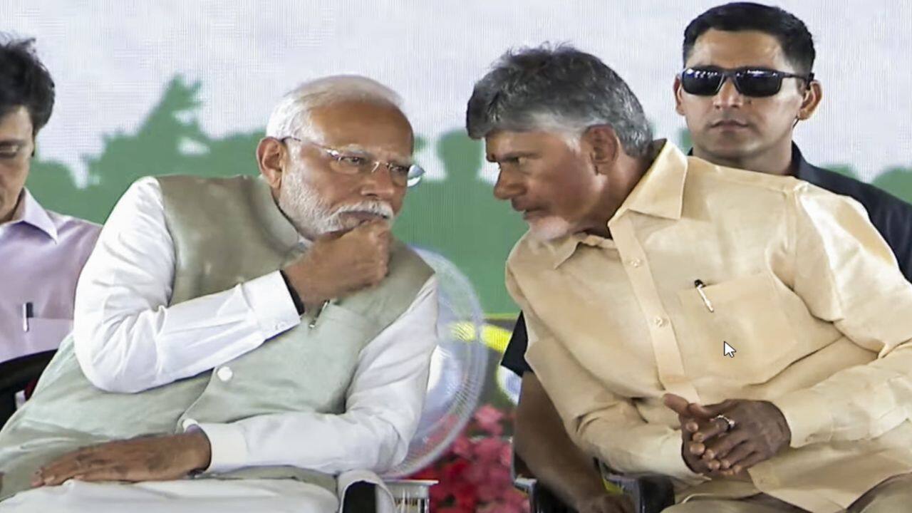 PM Modi hugged and patted Chandrababu Naidu on him assuming office.
