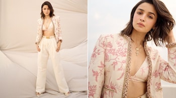 Alia Bhatt is wearing a beige bikini top adorned with a pink floral design, paired with a matching jacket featuring embellished borders and solid beige pants (Image: @aliaabhatt/Instagram)
