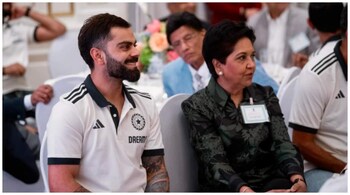 Virat Kohli and Indra Nooyi at the Indian consulate in New York. (image: @mufaddal_vohra/X)