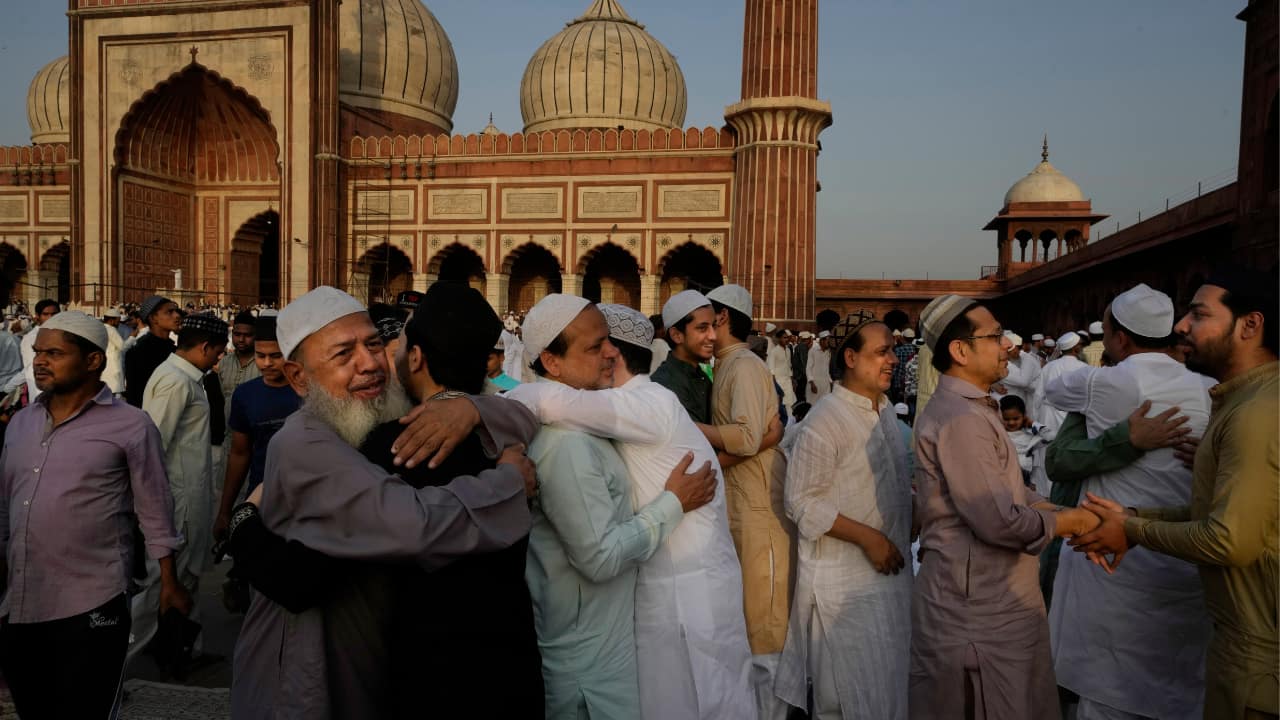 Devout Muslims greet and hug each other after offering Eid al-Adha prayers at the Jama Masjid, in New Delhi, India, Monday, June 17, 2024. (AP Photo)
