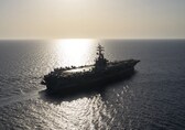 Yemen's Houthi rebels suspected of firing missiles at a container ship as an oil tanker burns