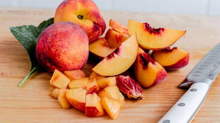 Peaches: Peaches are synonymous with summer and are surprisingly low in calories. A medium-sized peach has around 59 calories. They are a good source of vitamins A and C, which are important for maintaining healthy skin and vision. Peaches also provide fibre, potassium, and antioxidants, contributing to overall health and wellness. Their juicy, sweet flavour makes them an excellent addition to fruit salads, desserts, or even savoury dishes like grilled peach salad. The fibre content in peaches can help keep you feeling satisfied, making them a perfect option for those mindful of their caloric intake (Image: Canva)