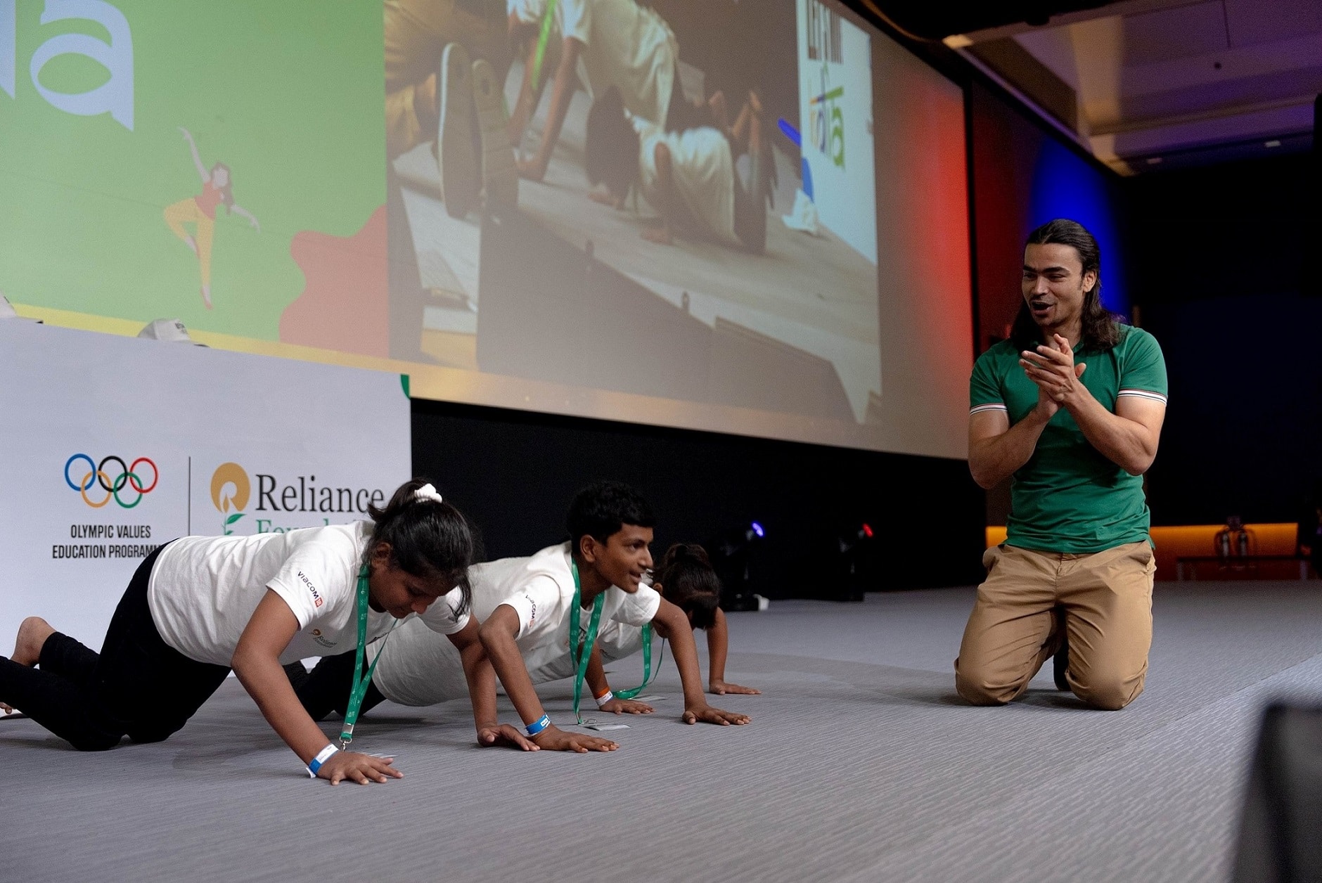 Six-time Olympian Shiva Keshavan cheers the kids as they take part in the Let's Move India carnival on the eve of Olympic Day in Mumbai