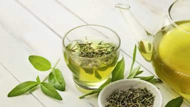 Green Tea: Contains the amino acid L-theanine, which can increase dopamine and serotonin levels in the brain, promoting relaxation and improving mood. Green tea also provides a moderate amount of caffeine for a gentle energy boost. (Image: Canva)