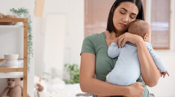 Motherhood is full of highs and lows, and it's okay to feel a range of emotions. Give yourself permission to experience and process your feelings without judgment or guilt. (Image: Canva)