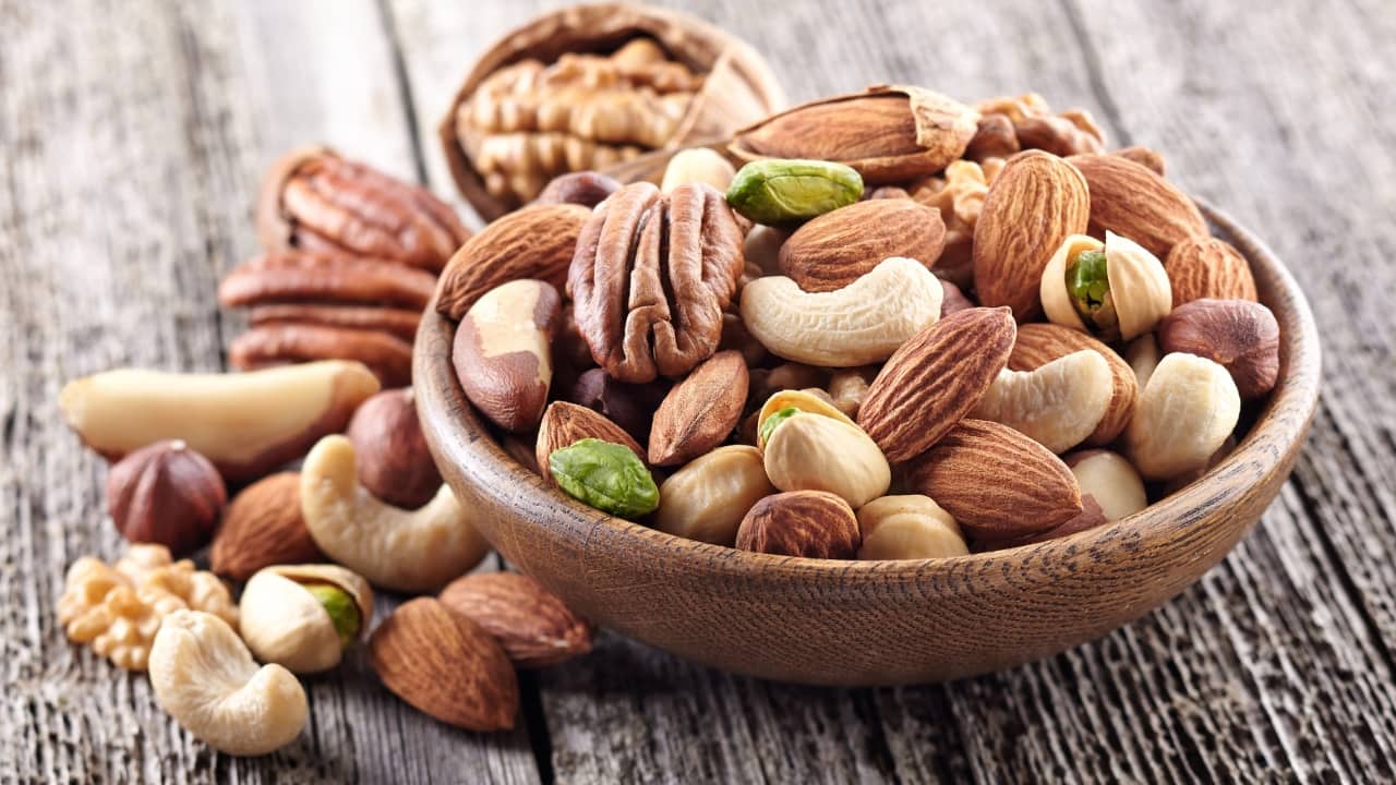 Benefits of nuts and seeds: Magnesium, healthy fats, and fibre in nuts and seeds help stabilise blood sugar levels, which can prevent mood swings and reduce stress (Image: Canva)