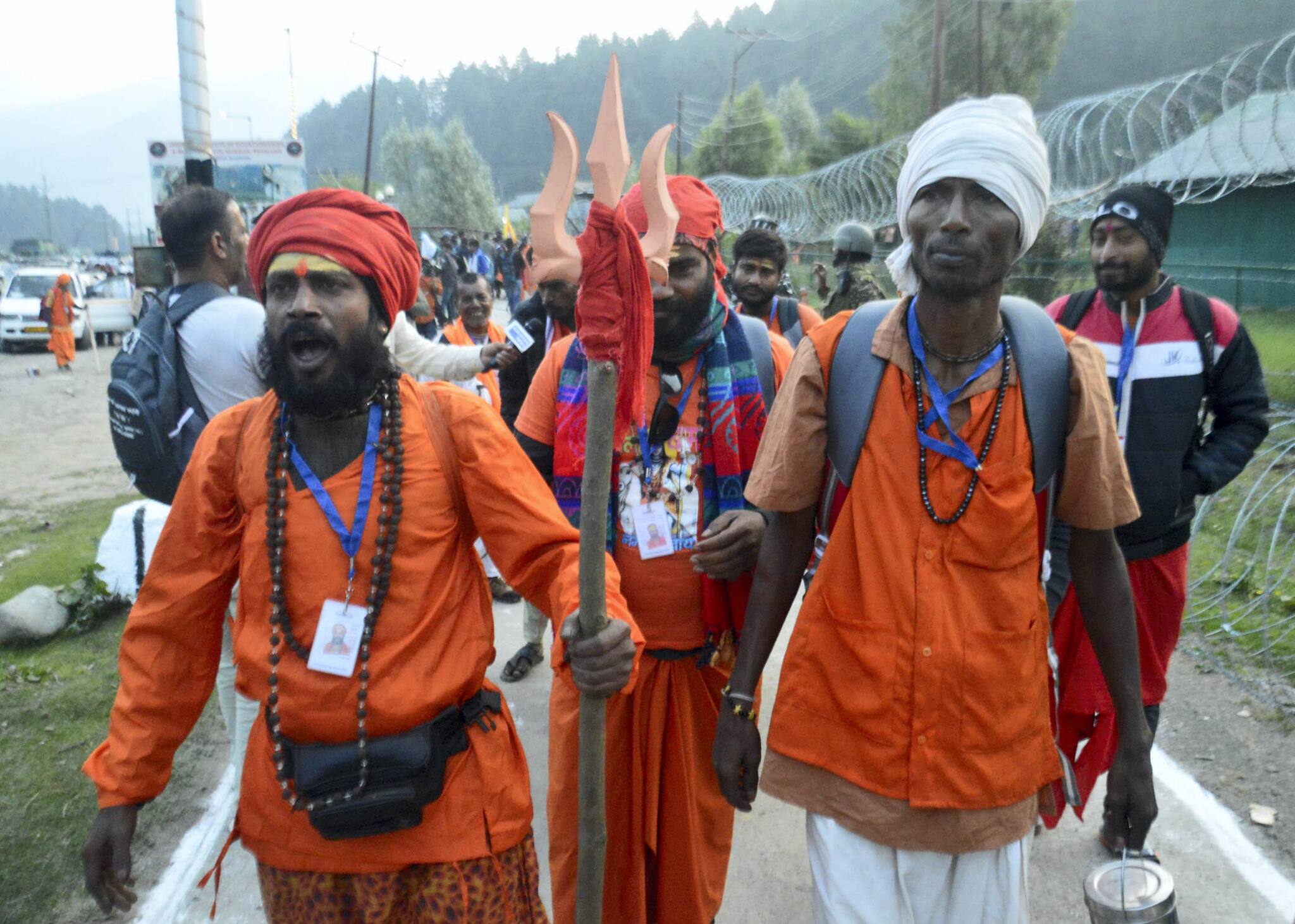The first convoy to Baltal left at 4 am, followed by the second to Pahalgam. The second batch, including 427 women and 294 seers, departed in 200 vehicles in separate convoys under security escort. (PTI Image)