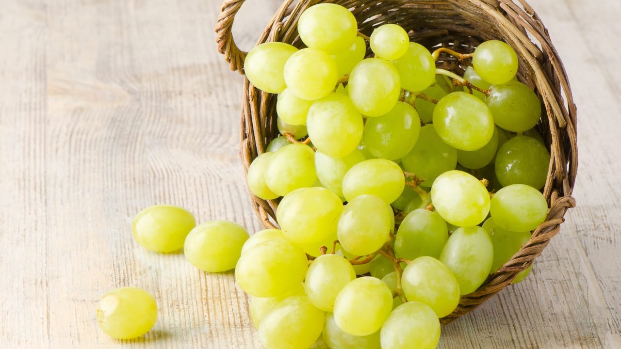 Grapes: Grapes are nutritious, packed with vitamins and antioxidants, but their high natural sugar content can lead to spikes in blood sugar levels, especially if consumed in large amounts. It's advisable for individuals with diabetes to monitor their intake and opt for smaller portions to manage blood glucose levels effectively (Image: Canva)