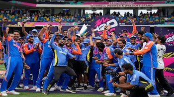 India's players celebrate with the winners' trophy after winning against South Africa in the ICC Men's T20 World Cup final cricket match at Kensington Oval in Bridgetown, Barbados, Saturday, June 29, 2024. AP/PTI