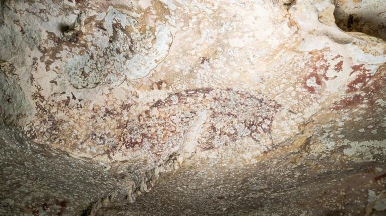 Discovery of a 51,000-year-old cave painting, the world's oldest, in ...