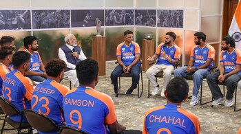 PM Modi interacts with members of Team India at his residence in Delhi. (PTI Photo)