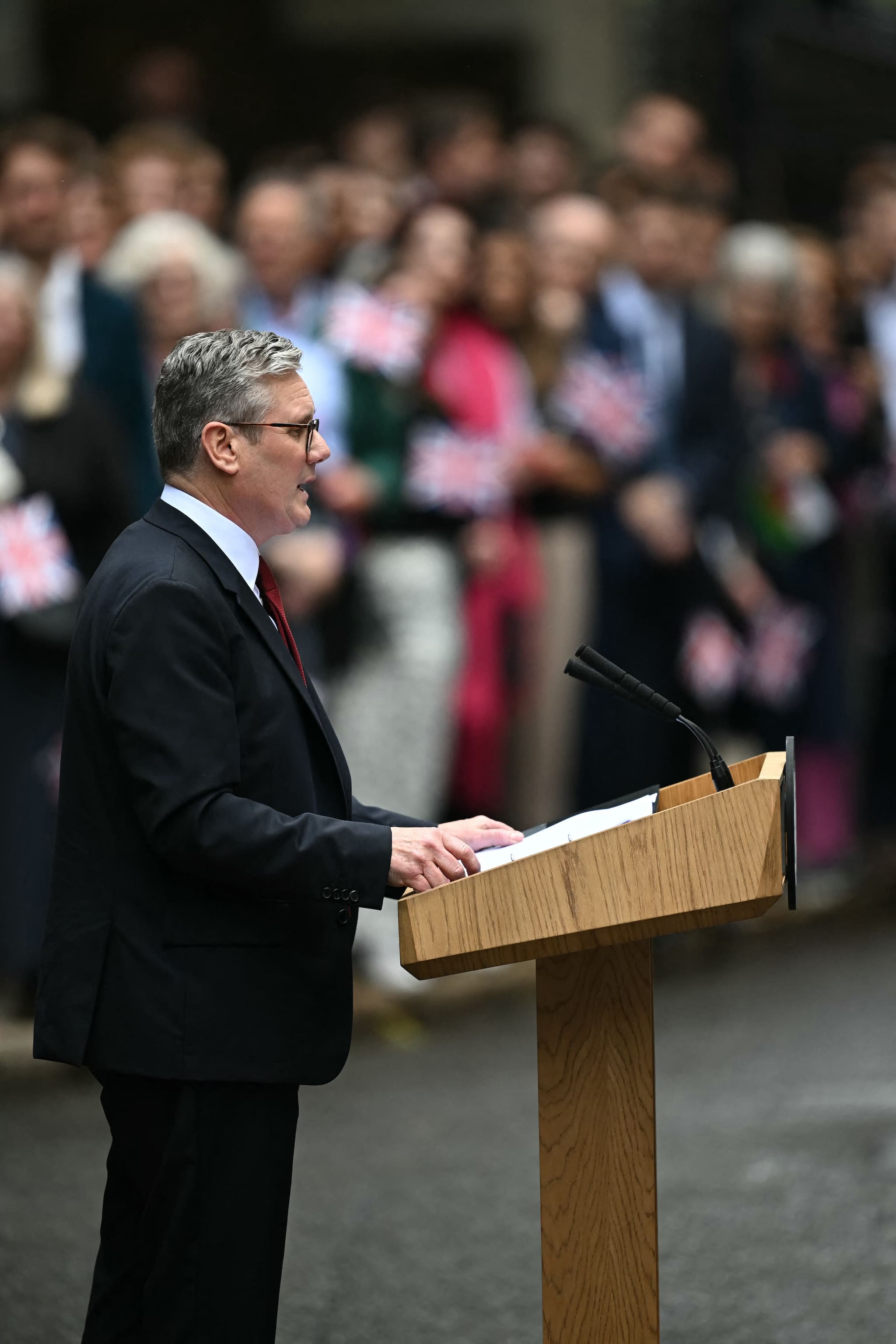 Starmer emphasized immediate action towards change and national renewal in his statements outside Downing Street. (AFP Photo)