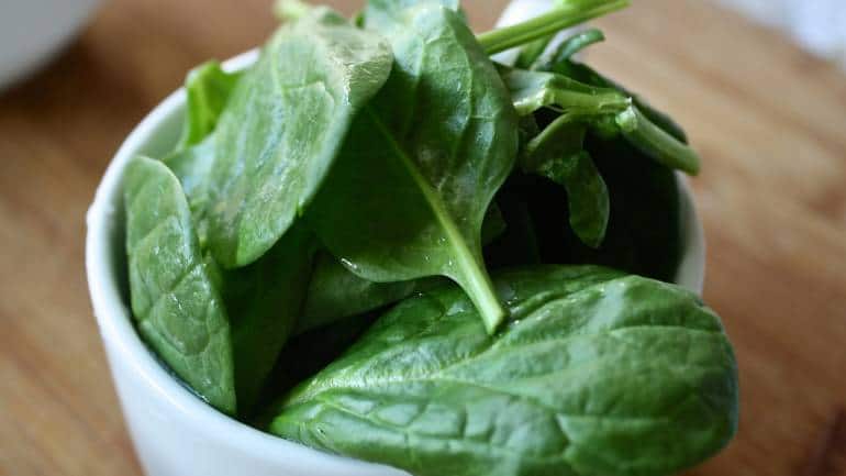 Spinach: Spinach is packed with non-heme iron and vitamin C, which helps with iron absorption. It's also rich in folate, another essential nutrient for red blood cell production. A quick recipe: sauté spinach with garlic and olive oil for a nutritious side dish (Image: Canva)