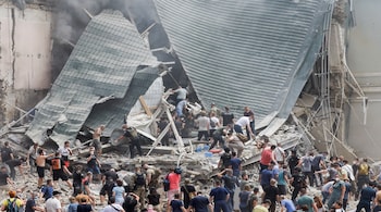 Rescuers work at Ohmatdyt Children's Hospital that was damaged during a Russian missile strikes, amid Russia's attack on Ukraine, in Kyiv