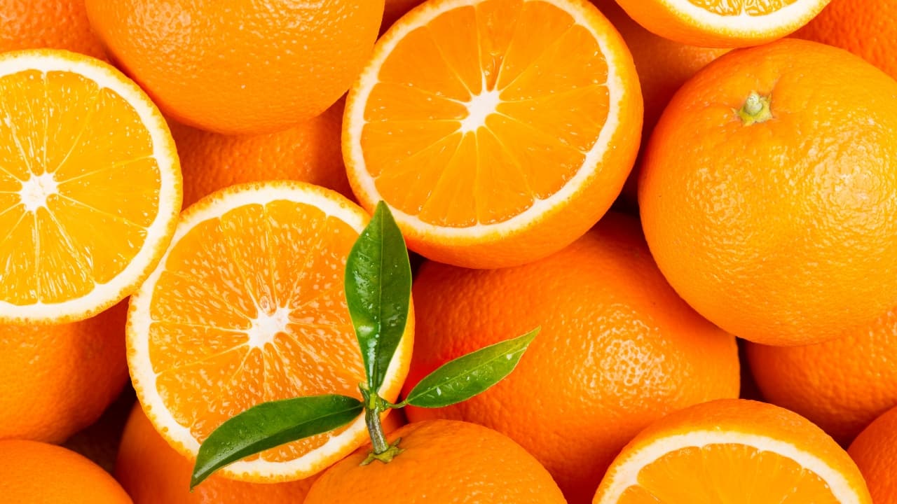 Oranges: High in vitamin C, oranges reduce stress and promote relaxation, facilitating better sleep. The citrus fruit's natural sweetness and hydrating properties make it a soothing choice before bed, potentially aiding in winding down and preparing for a peaceful night's rest. (Image: Canva)