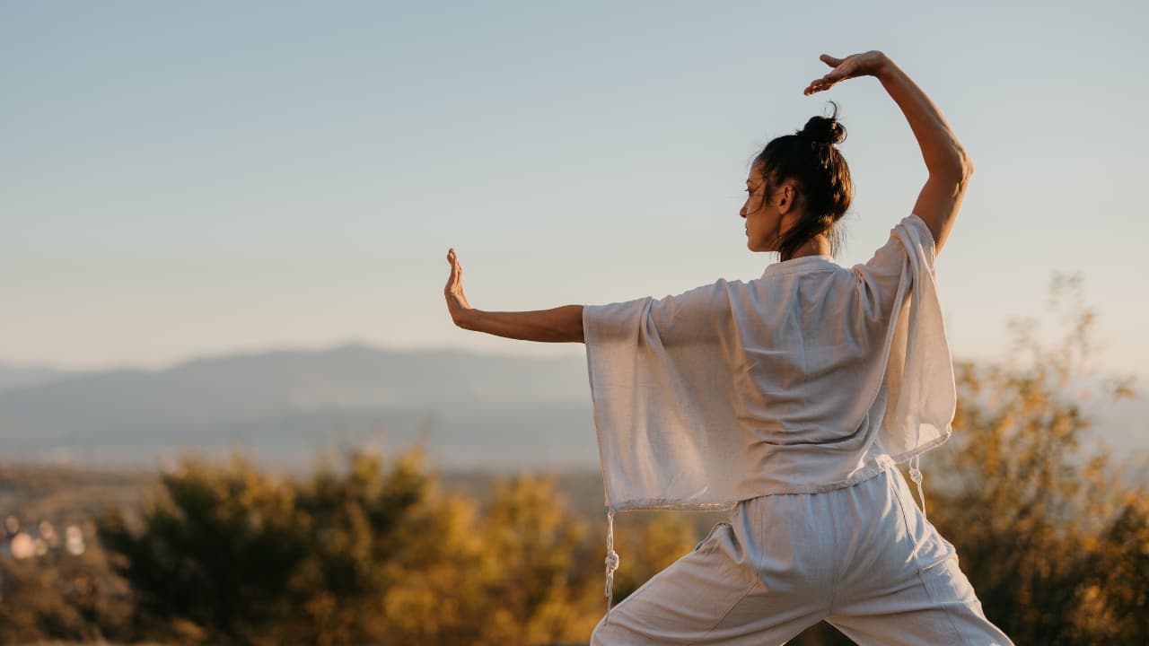 Tai Chi: Tai Chi is a low-impact martial art characterized by slow, flowing movements combined with deep, controlled breathing. Practicing Tai Chi in the evening helps reduce stress and tension, promoting a sense of calm and mental clarity. The meditative aspect of Tai Chi encourages relaxation and improves overall sleep quality (Image: Canva)