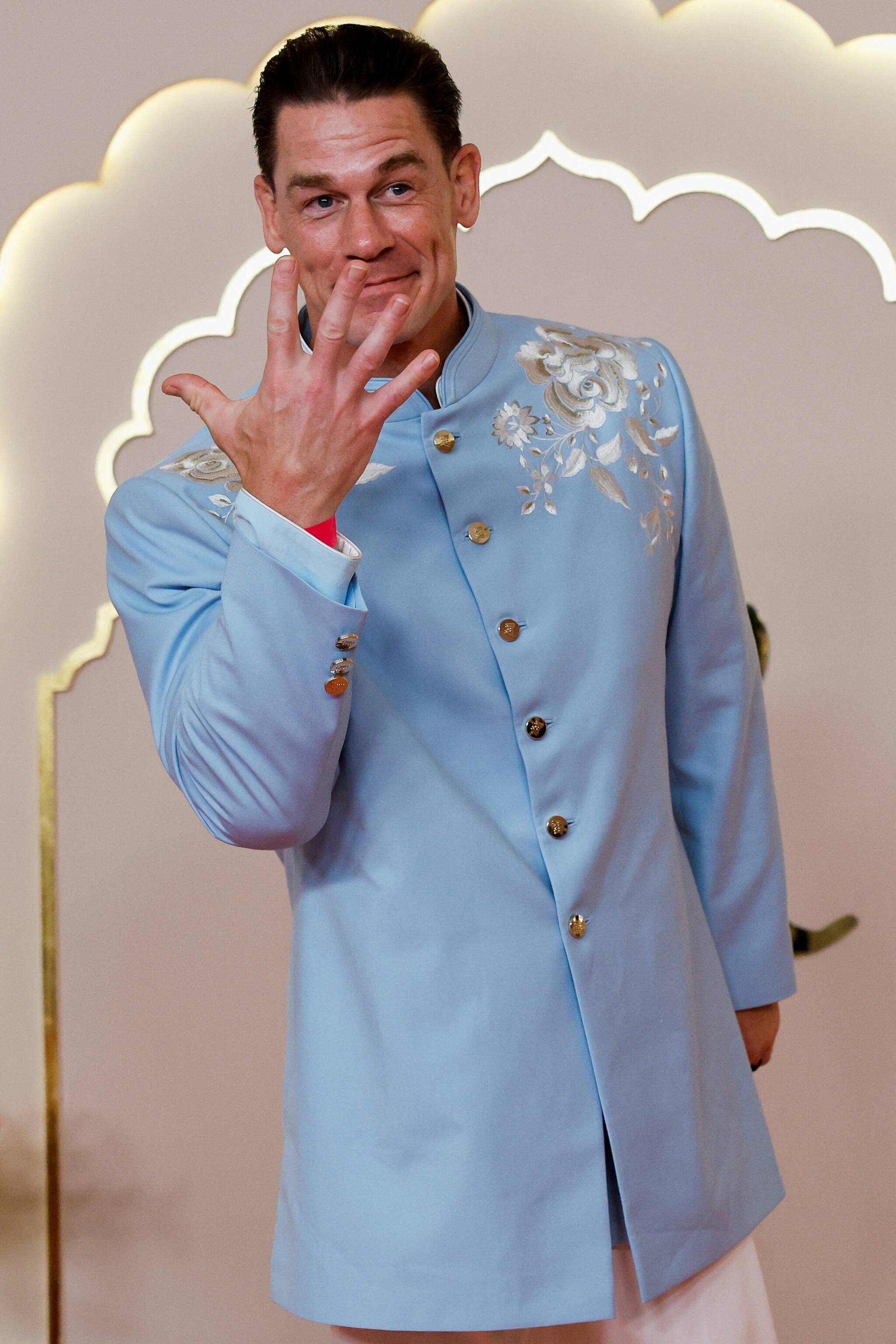 John Cena poses for pictures on the red carpet on the day of the wedding of Anant Ambani and Radhika Merchant in Mumbai, India, July 12, 2024. REUTERS/Francis Mascarenhas