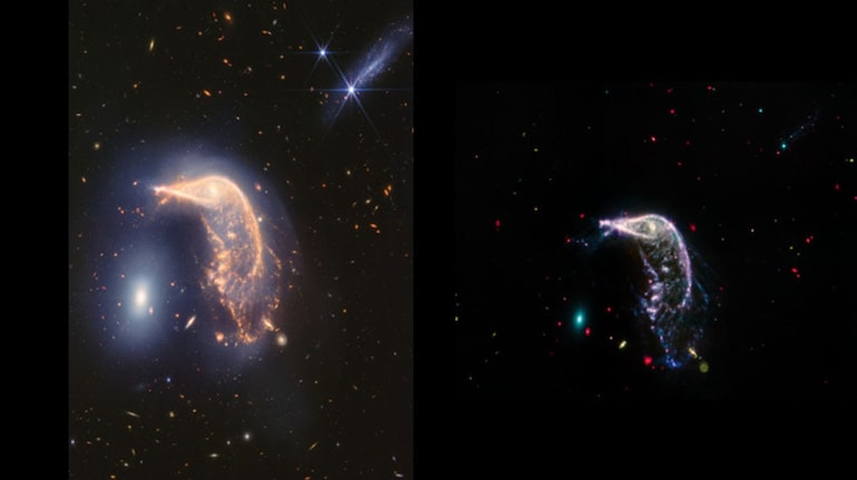 Cosmic merging of two glowing galaxies in space, mesmerising image ...