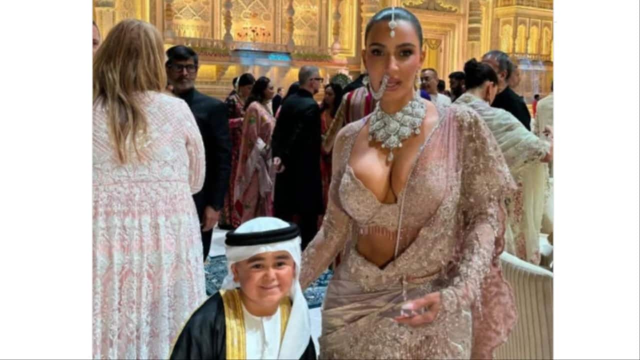 Abdu Rozik poses with Kim Kardashian at Anant Ambani and Radhika Merchant’s star-studded wedding