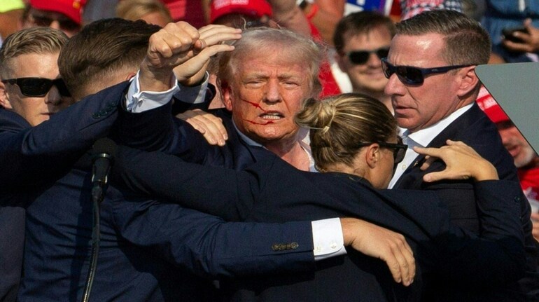 Donald Trump arrives in Milwaukee for Republican convention after ...