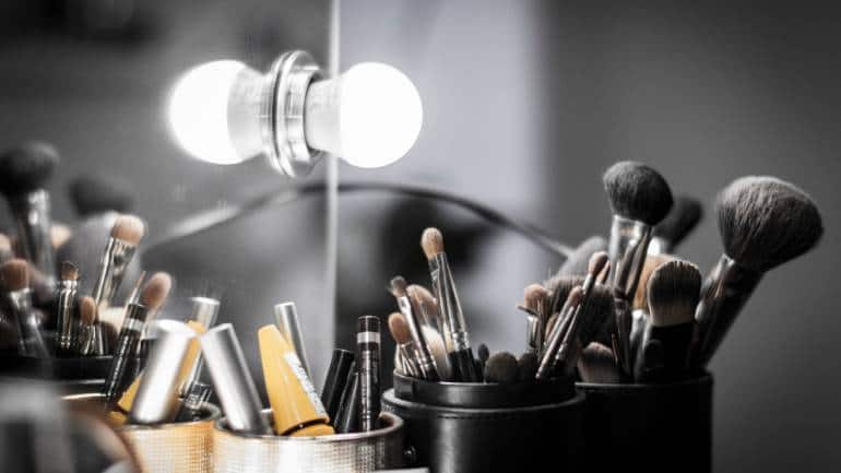 Heavy makeup: While not exactly clothing, heavy makeup can be a disaster during monsoon. The humidity and rain can cause it to smudge and run. Opt for waterproof and minimal makeup to maintain a fresh look throughout the day (Image: Canva) Heavy makeup: While not exactly clothing, heavy makeup can be a disaster during monsoon. The humidity and rain can cause it to smudge and run. Opt for waterproof and minimal makeup to maintain a fresh look throughout the day (Image: Canva)