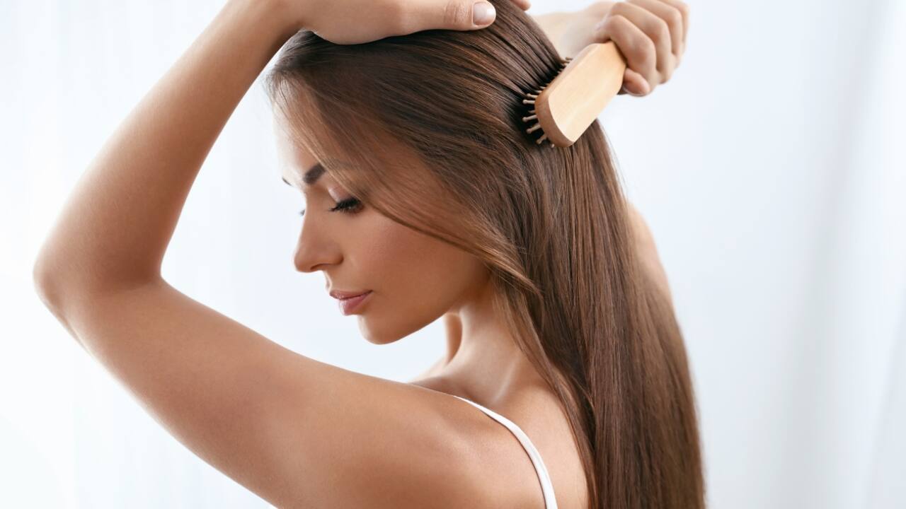 Avoid Heat and Chemical Treatments: Minimizing use of hair dryers, straighteners, and chemical treatments prevents damage to hair follicles, reducing the risk of hair thinning and breakage (Image: Canva)