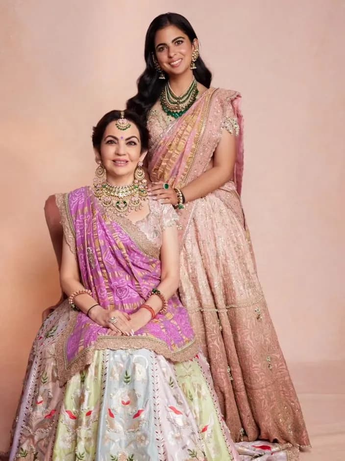 Isha and Nita Ambani in Anamika Khanna outfits.
