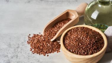 Flaxseeds: Like chia seeds, flaxseeds are highly beneficial due to their rich content of soluble fibre and lignans. These seeds help regulate blood sugar levels, promote gut health, and support a feeling of fullness, making it a crucial addition to diet for weight loss. (Image: Canva)