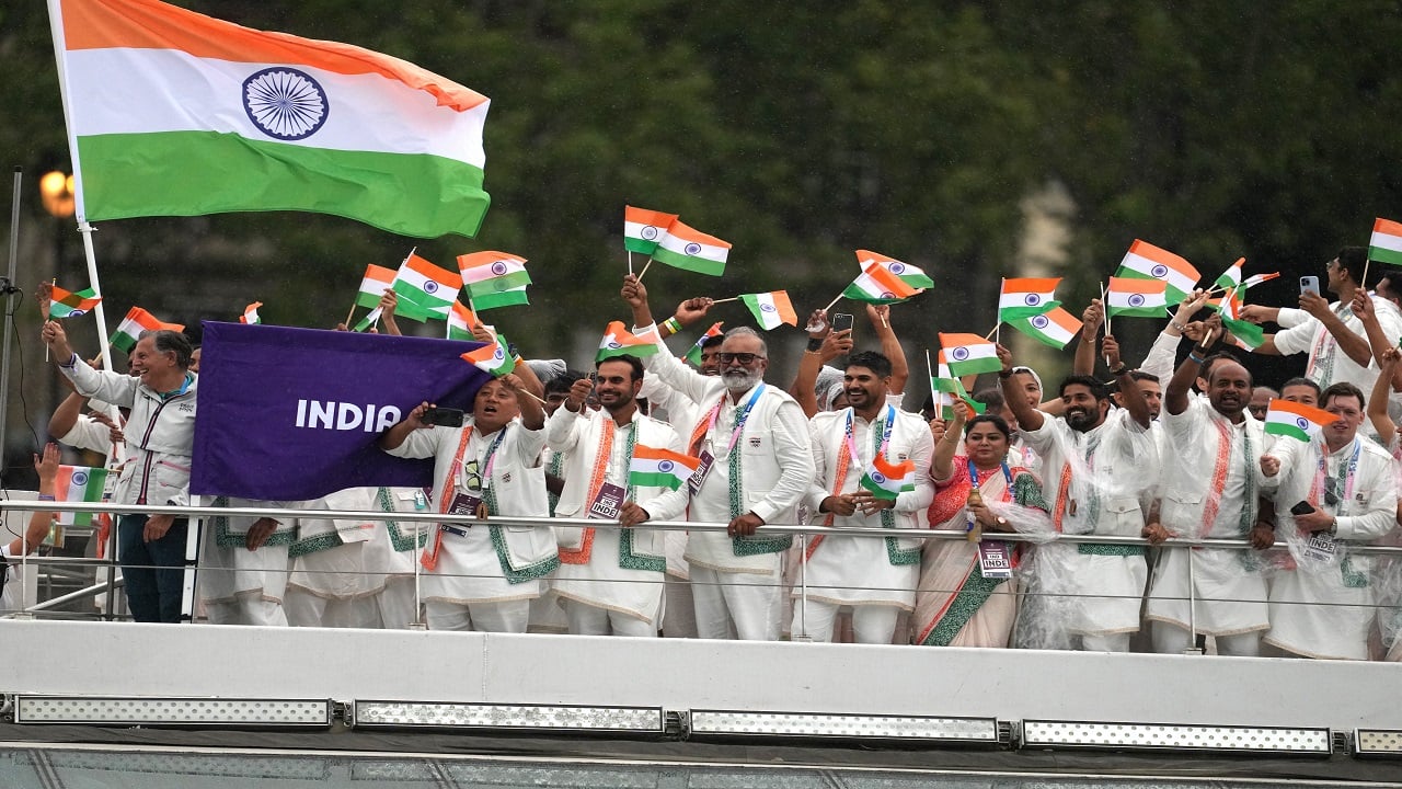 Team India are seen on a boat along the River Seine during the opening ceremony of the Paris Olympics 2024