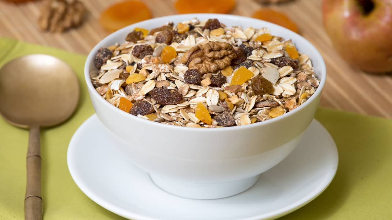 Muesli: Muesli is a blend of whole grains, nuts, seeds, and dried fruits, making it a fibre-rich option for breakfast. The combination of ingredients ensures a mix of soluble and insoluble fibre, along with healthy fats and protein. Muesli can be eaten cold with milk or yoghurt or soaked overnight for a softer texture (Image: Canva)