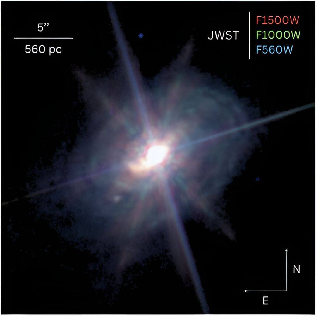 A three-colour image of the galaxy ESO 428-G14 taken by the James Webb Space Telescope. (Image: NASA/JWST)
